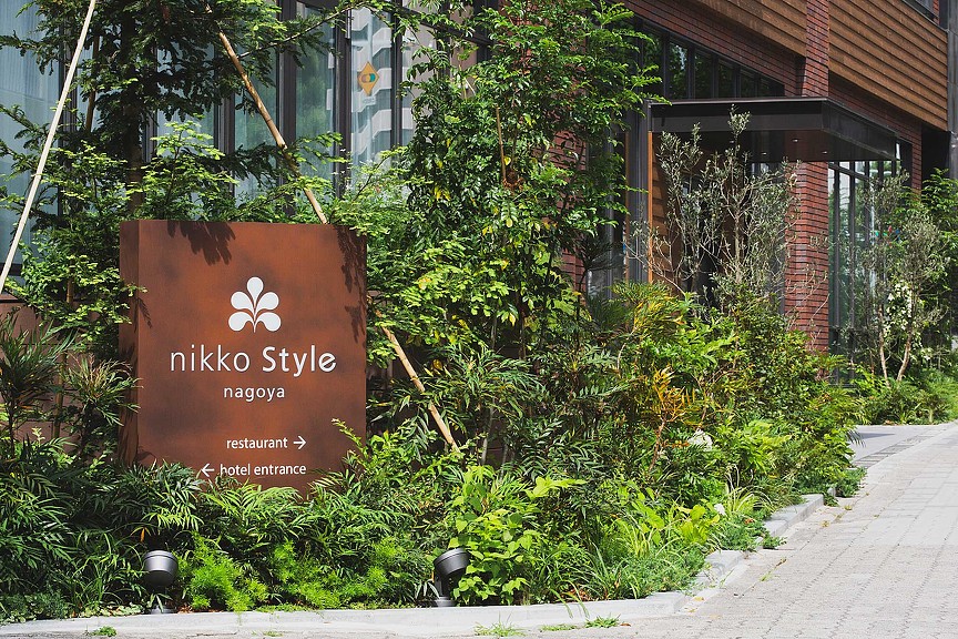 A sign in front of a building.